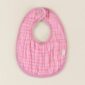 Pink baby bib with snap closure