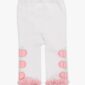 White baby pants with pink ruffle and pumpkin design.