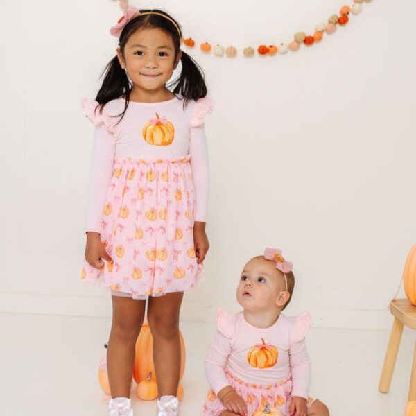 sweet wink pink pumpkin dress Children in pumpkin print dresses for fall