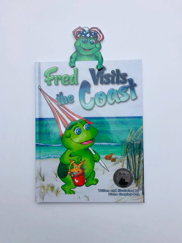 apple pie publishing fred visits the coast children's book Children's book cover: Fred Visits the Coast.