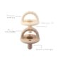 Cream pacifiers with textured handles and silicone nipples.