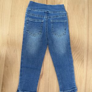 Back view of blue children's jeans.