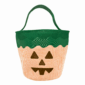 Striped pumpkin bag with green top and handle.