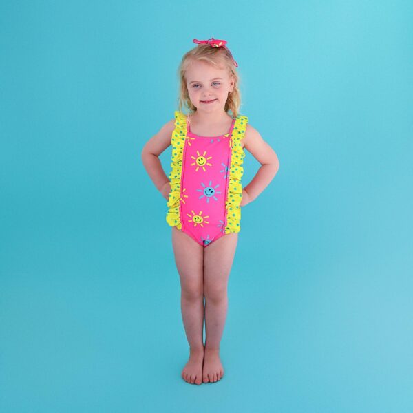 gigi and max brittany smiley face tank one piece swimsuit Child in colorful swimsuit on blue background