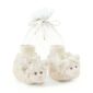 Cute lamb-themed baby booties gift set.