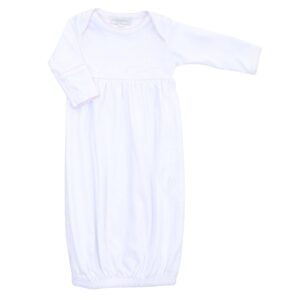 White infant gown with long sleeves and elastic hem.